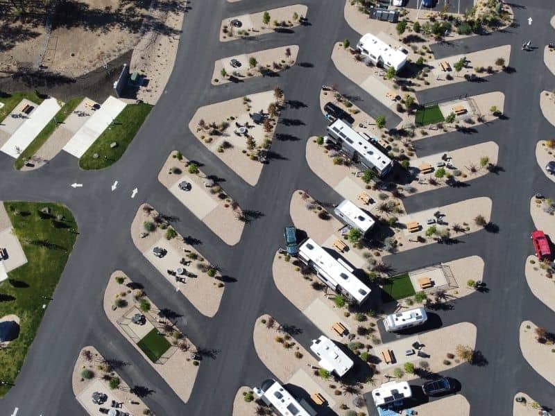 Due diligence survey rv park - Alexander City Land Surveying Aerial view of an RV park with organized pads and internal drives, showing the property layout considered in a due diligence survey